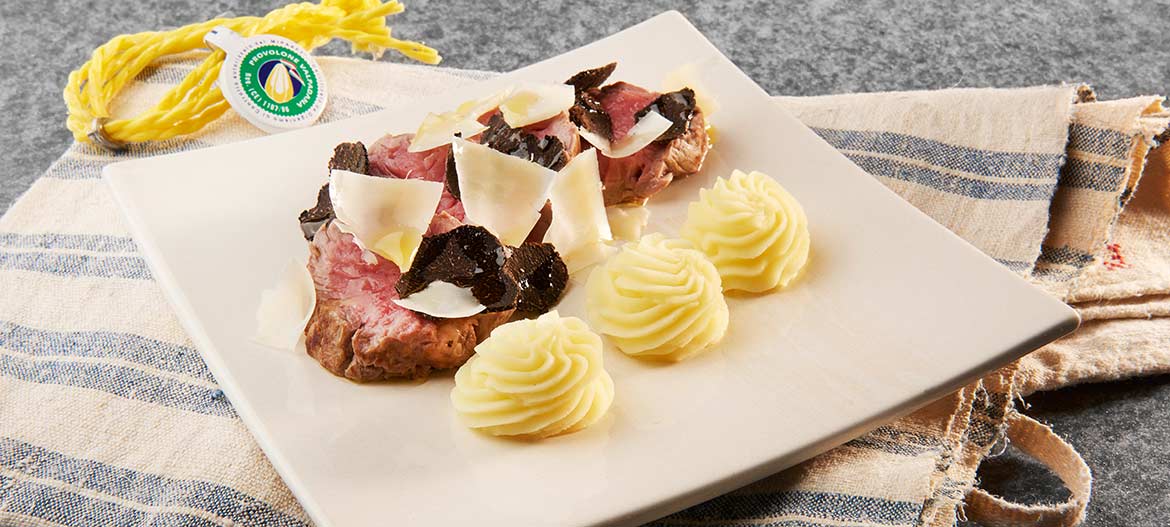 Beef fillet with strong Provolone Valpadana P.D.O. and black truffle