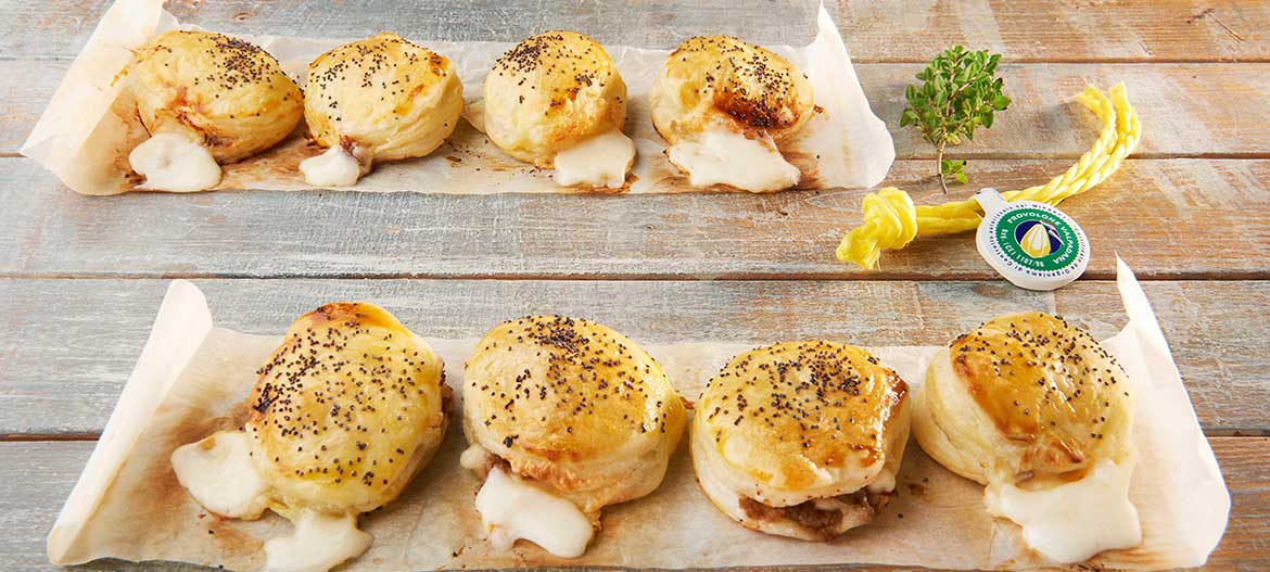 Puff pastry medallions with mild Provolone Valpadana P.D.O. and sausage