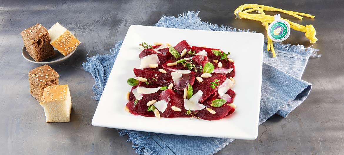 Red beet carpaccio with strong Provolone Valpadana P.D.O.