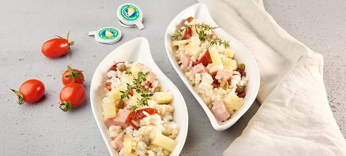 Rice salad with strong Provolone Valpadana, Mortadella Bologna and Capers