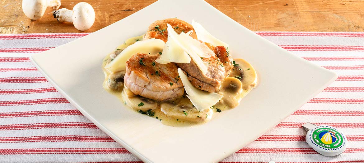 Pork tenderloin with mushrooms and strong Provolone Valpadana