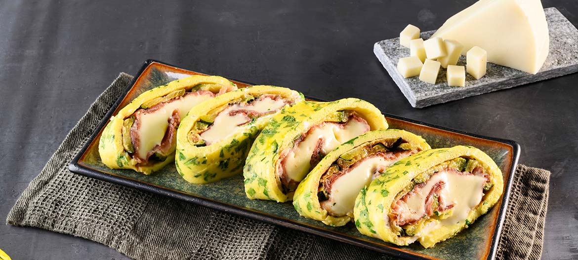 Rotolo di frittata con Speck, zucchine e Provolone Valpadana dolce