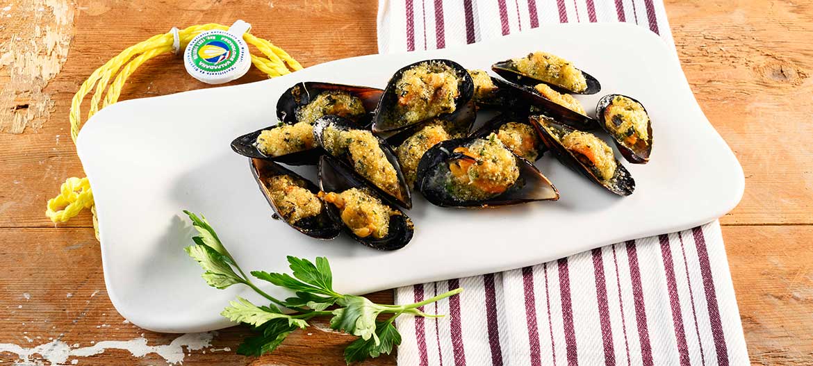 mejillones gratinados con Provolone Valpadana picante