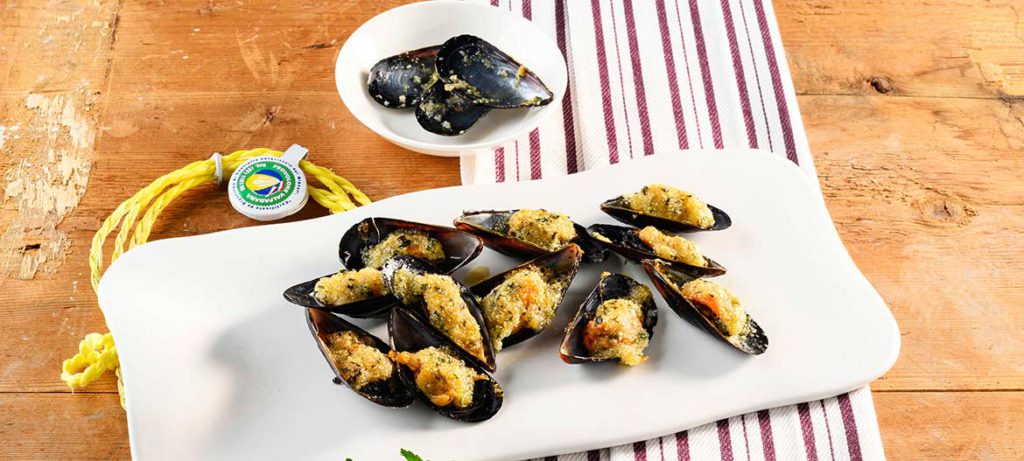 Natale a tavola Cozze gratinate con Provolone Valpadana