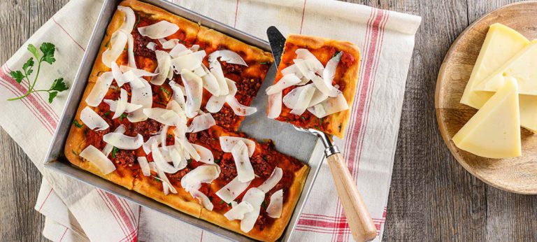 Red pizza with strong Provolone Valpadana and ‘Nduja