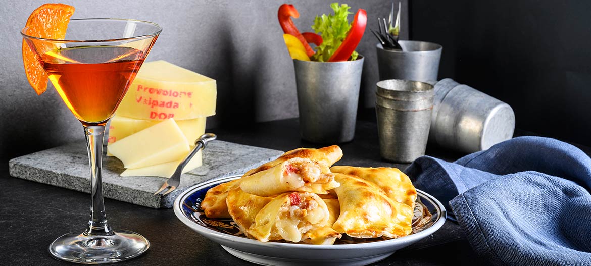 Chicken empanadas with mild Provolone Valpadana