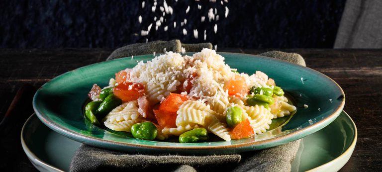 Farfalle pasta with Broad Beans Guanciale and Provolone Valpadana